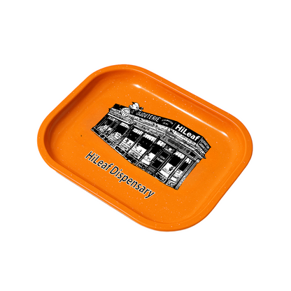  7" x 3" metal rolling tray in orange with dispensary branded artwork and full-color customization across entire surface