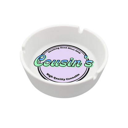 White plastic ashtray with colorful branding printed in the center